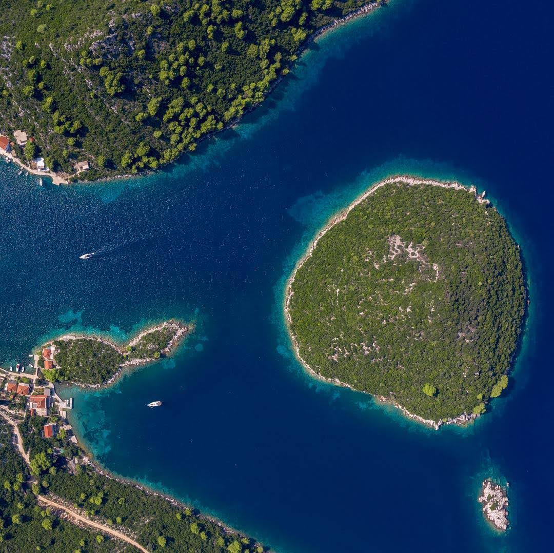 Aerial of a green islet in the Adriatic
